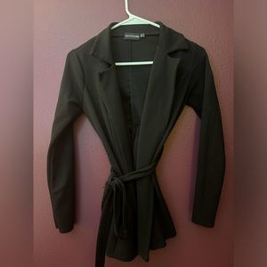 Small. Nice blazer. Goes with everything and makes any outfit elegant.